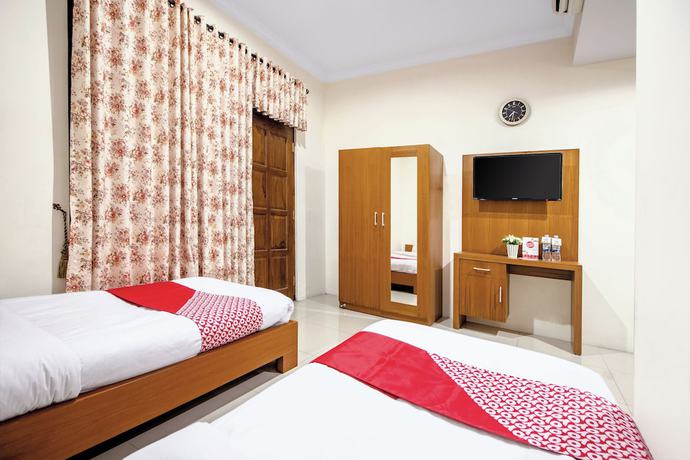 Imagen de la habitación del Hotel OYO 250 De\'gadri Ndalem. Foto 10
