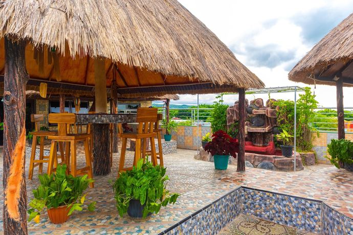 Imagen del bar/restaurante del Hotel OYO 2518 Wilma Ii Premier. Foto 5