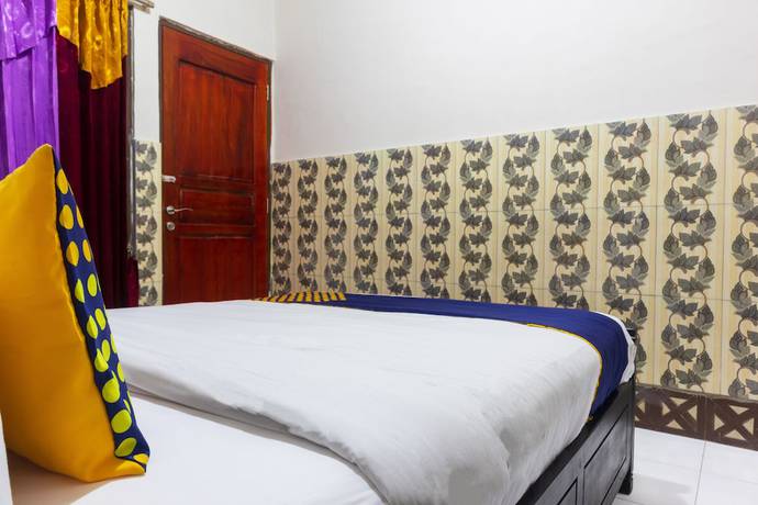 Imagen de la habitación del Hotel OYO 2518 Wilma Ii Premier. Foto 9