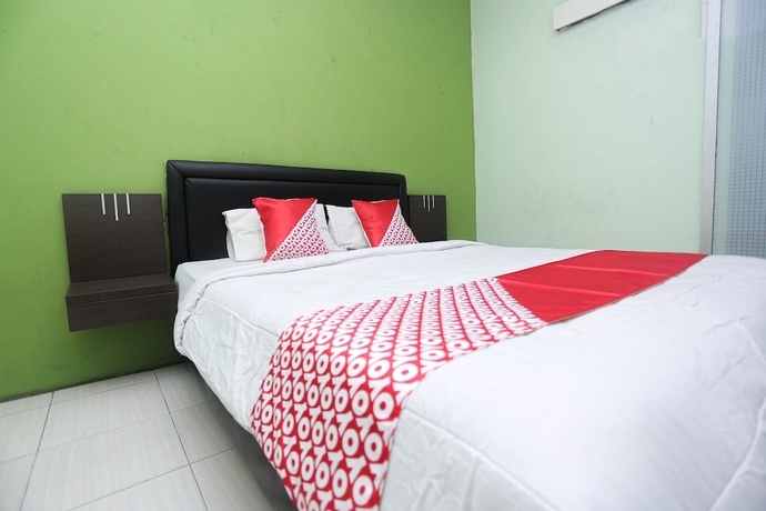 Imagen de la habitación del Hotel OYO 2524 Royal Borneo Guesthouse. Foto 2