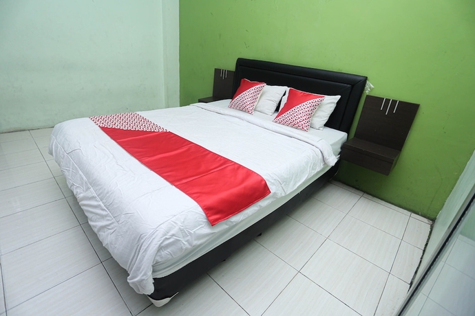 Imagen de la habitación del Hotel OYO 2524 Royal Borneo Guesthouse. Foto 3