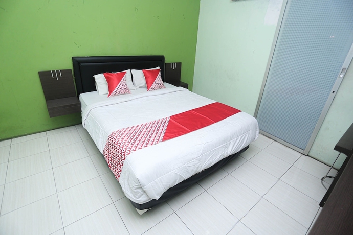 Imagen de la habitación del Hotel OYO 2524 Royal Borneo Guesthouse. Foto 4