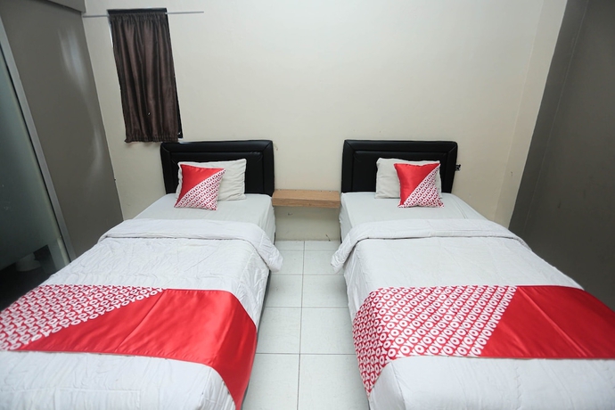 Imagen de la habitación del Hotel OYO 2524 Royal Borneo Guesthouse. Foto 5