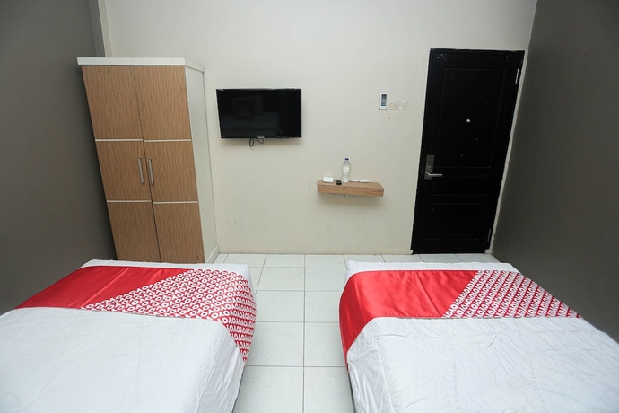 Imagen de la habitación del Hotel OYO 2524 Royal Borneo Guesthouse. Foto 6