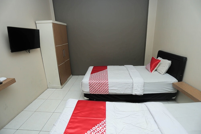 Imagen de la habitación del Hotel OYO 2524 Royal Borneo Guesthouse. Foto 7
