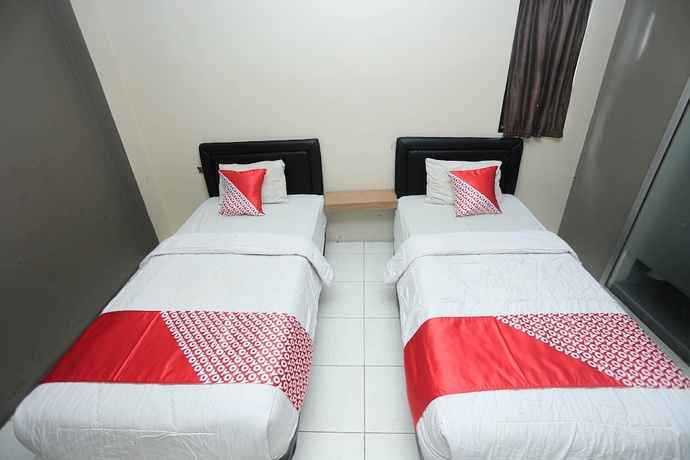Imagen de la habitación del Hotel OYO 2524 Royal Borneo Guesthouse. Foto 8