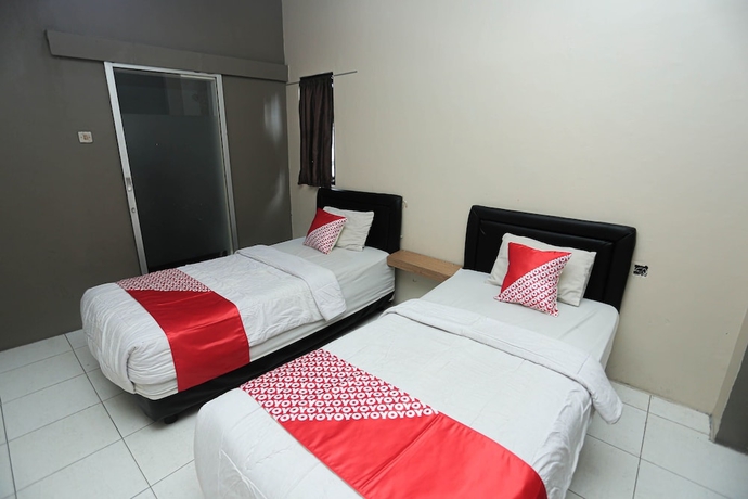 Imagen de la habitación del Hotel OYO 2524 Royal Borneo Guesthouse. Foto 10