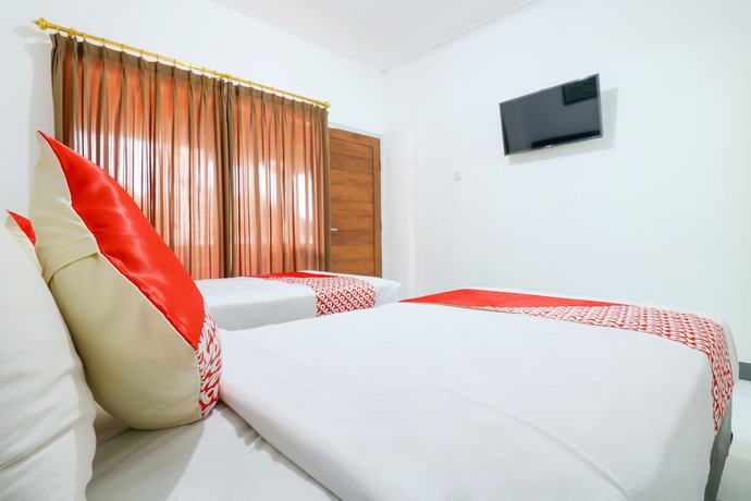 Imagen de la habitación del Hotel OYO 2548 Rasa Sayang Inn. Foto 9