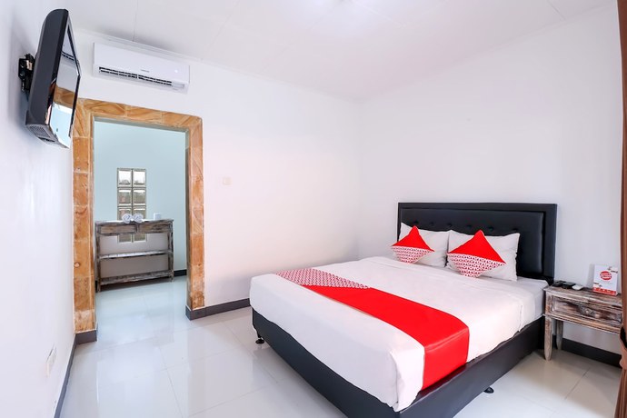 Imagen de la habitación del Hotel OYO 2548 Rasa Sayang Inn. Foto 13