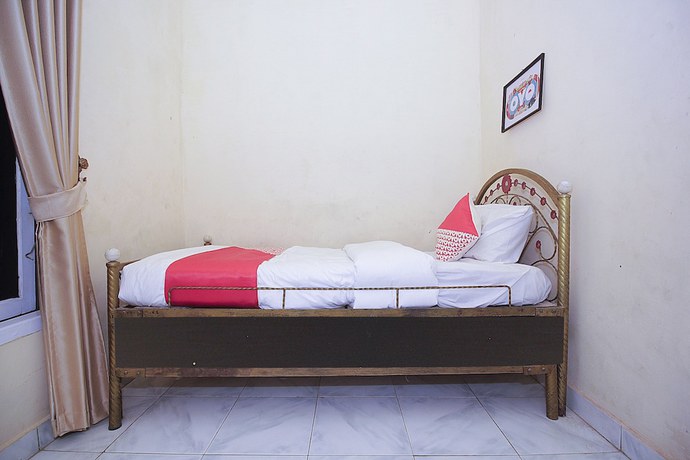 Imagen de la habitación del Hotel OYO 2555 Diva Residen Syariah. Foto 2