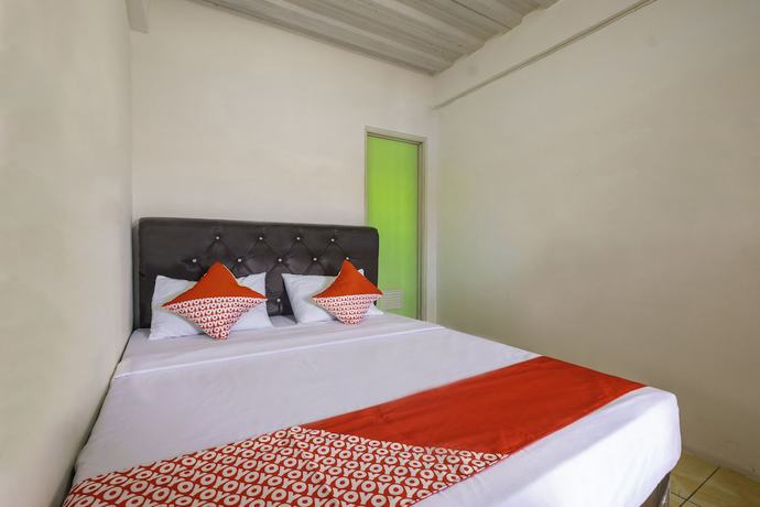Imagen de la habitación del Hotel OYO 2562 Pondok Tajlibu Syifa Syariah. Foto 10