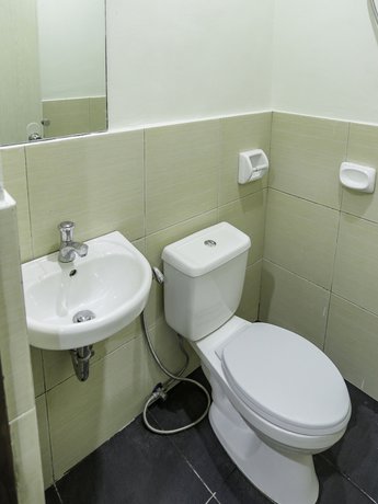 Imagen de la habitación del Hotel OYO 257 Jrja Suites. Foto 10