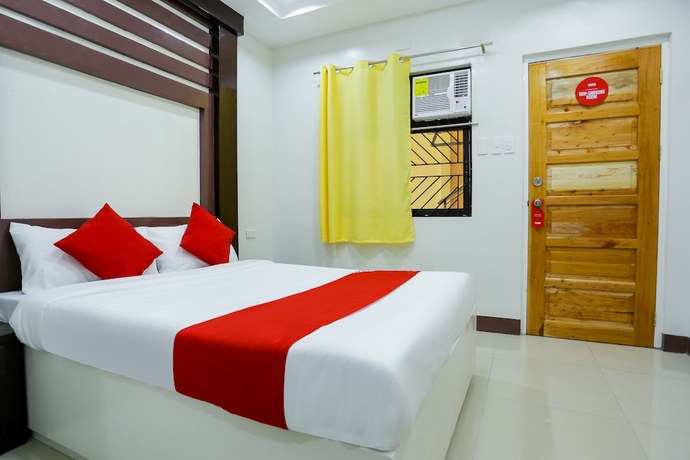 Imagen de la habitación del Hotel OYO 257 Jrja Suites. Foto 11