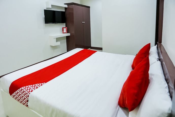 Imagen de la habitación del Hotel OYO 257 Jrja Suites. Foto 12