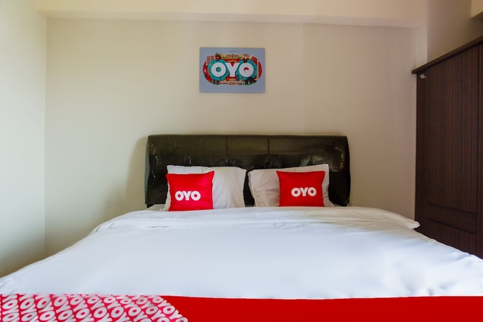 Imagen de la habitación del Hotel OYO 2582 Apartemen Serpong Green View. Foto 10