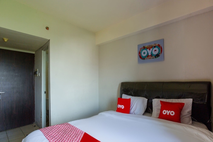 Imagen de la habitación del Hotel OYO 2582 Apartemen Serpong Green View. Foto 13