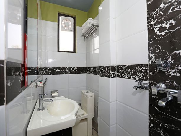 Imagen de la habitación del Hotel OYO 2629 Royal Odyssey. Foto 13