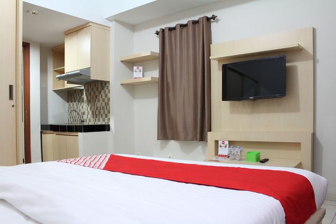 Imagen de la habitación del Hotel OYO 266 Margonda Residence 5. Foto 3