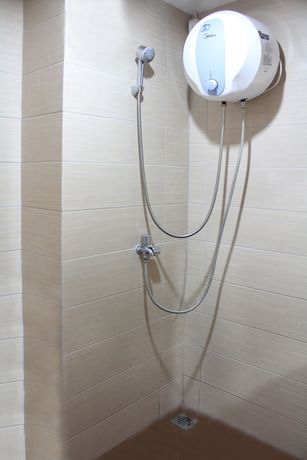 Imagen de la habitación del Hotel OYO 266 Margonda Residence 5. Foto 4