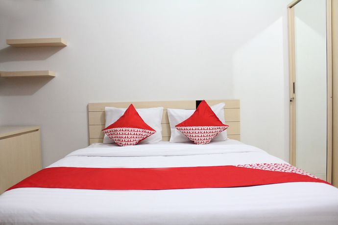 Imagen de la habitación del Hotel OYO 266 Margonda Residence 5. Foto 8