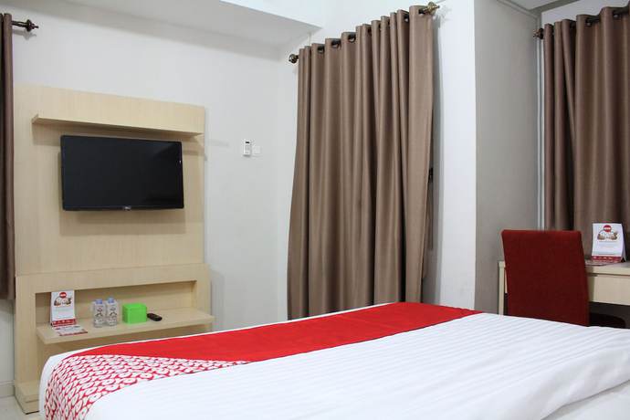 Imagen de la habitación del Hotel OYO 266 Margonda Residence 5. Foto 9