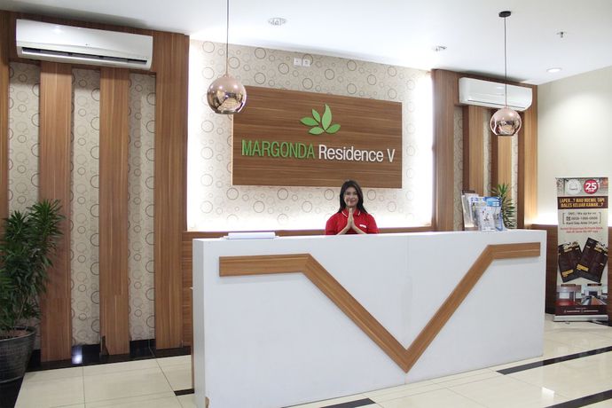 Imagen de los interiores del Hotel OYO 266 Margonda Residence 5. Foto 16