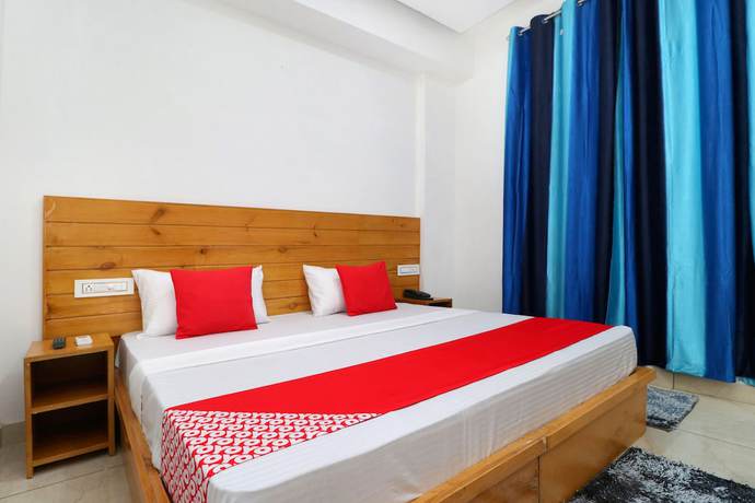 Imagen de la habitación del Hotel OYO 26606 R K Grand. Foto 2