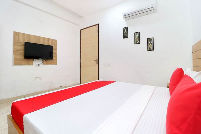 Imagen de la habitación del Hotel OYO 26606 R K Grand. Foto 5