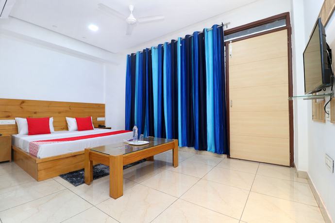 Imagen de la habitación del Hotel OYO 26606 R K Grand. Foto 6