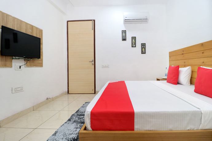 Imagen de la habitación del Hotel OYO 26606 R K Grand. Foto 9