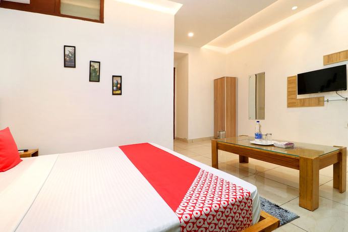 Imagen de la habitación del Hotel OYO 26606 R K Grand. Foto 10