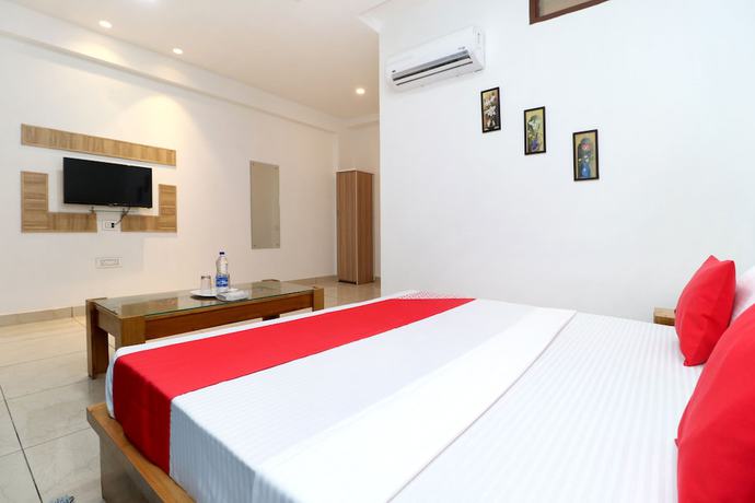 Imagen de la habitación del Hotel OYO 26606 R K Grand. Foto 12