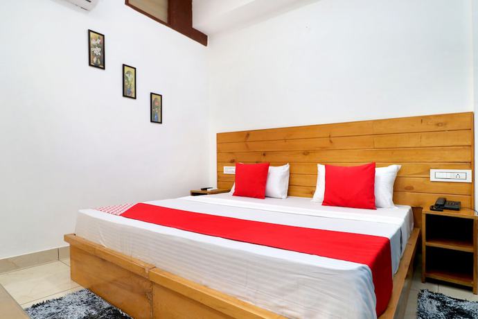 Imagen de la habitación del Hotel OYO 26606 R K Grand. Foto 13