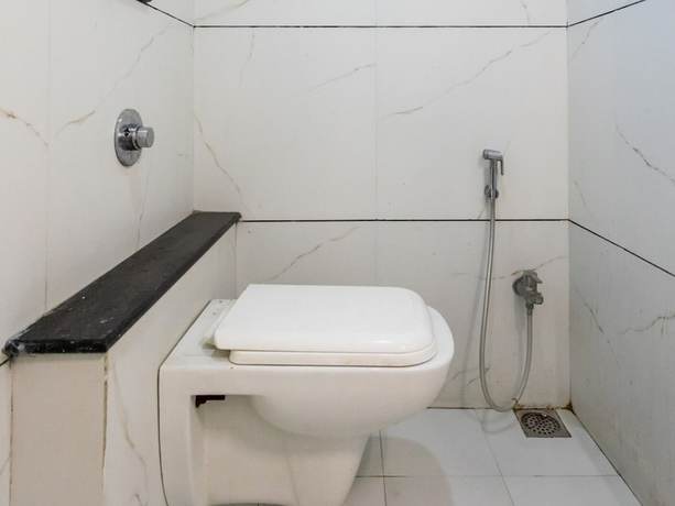 Imagen de la habitación del Hotel OYO 26606 R K Grand. Foto 14