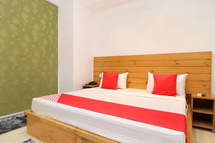 Imagen de la habitación del Hotel OYO 26606 R K Grand. Foto 15