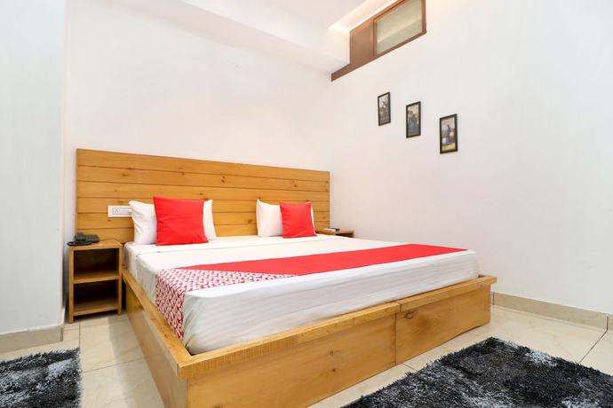 Imagen de la habitación del Hotel OYO 26606 R K Grand. Foto 16