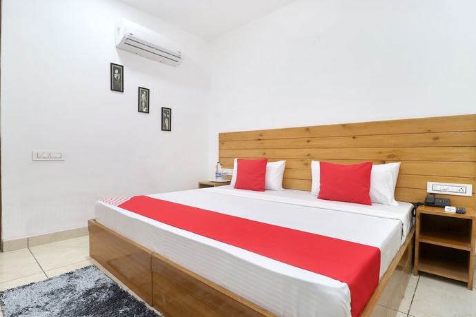 Imagen de la habitación del Hotel OYO 26606 R K Grand. Foto 17