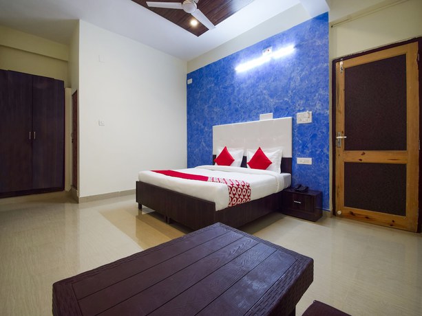 Imagen de la habitación del Hotel OYO 26659 Parmanand Garden. Foto 6