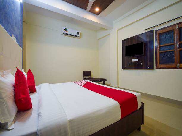 Imagen de la habitación del Hotel OYO 26659 Parmanand Garden. Foto 8