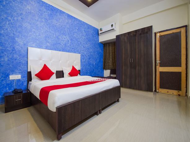 Imagen de la habitación del Hotel OYO 26659 Parmanand Garden. Foto 9