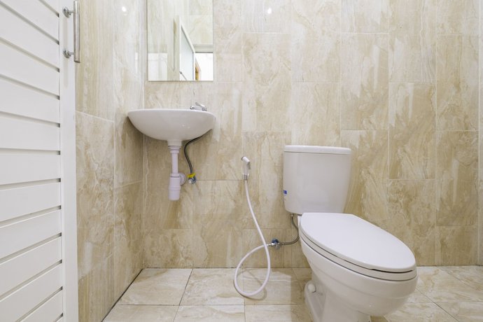 Imagen de la habitación del Hotel OYO 2674 Siliwangi Guest House Syariah. Foto 3