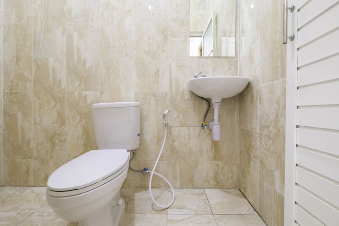 Imagen de la habitación del Hotel OYO 2674 Siliwangi Guest House Syariah. Foto 11