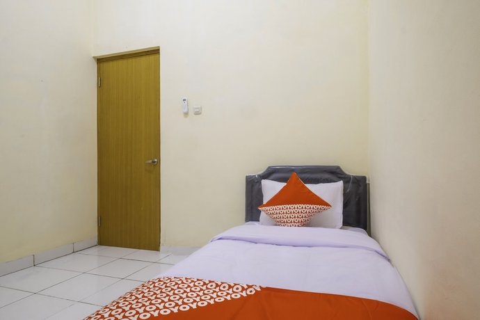 Imagen de la habitación del Hotel OYO 2674 Siliwangi Guest House Syariah. Foto 12