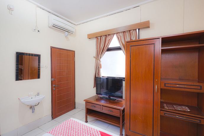 Imagen de la habitación del Hotel OYO 2675 Hotel Sebelas Syariah. Foto 14