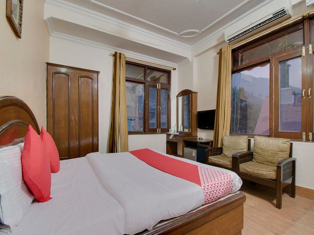 Imagen de la habitación del Hotel OYO 26837 White House. Foto 4