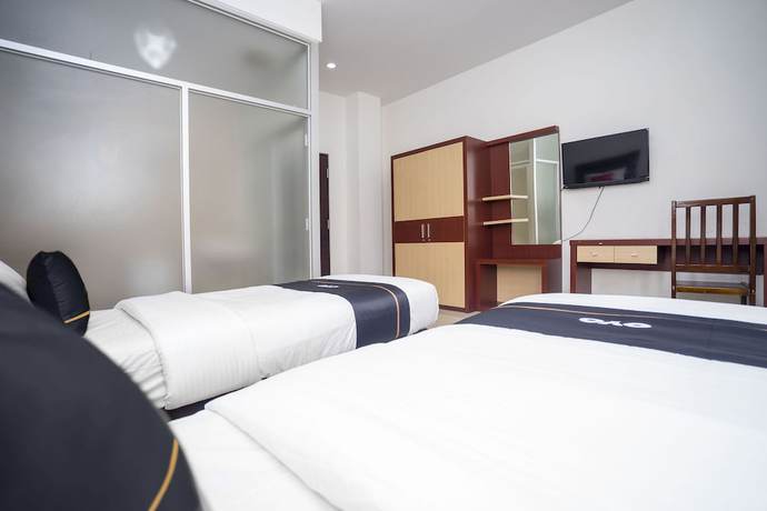 Imagen de la habitación del Hotel OYO 2695 D\'es Guest House. Foto 5