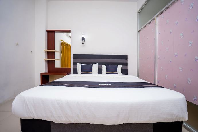 Imagen de la habitación del Hotel OYO 2695 D\'es Guest House. Foto 10