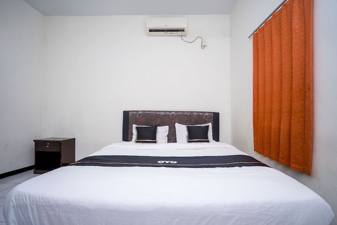 Imagen de la habitación del Hotel OYO 2695 D\'es Guest House. Foto 12