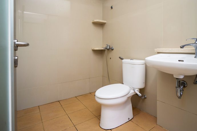 Imagen de la habitación del Hotel OYO 2695 D\'es Guest House. Foto 14