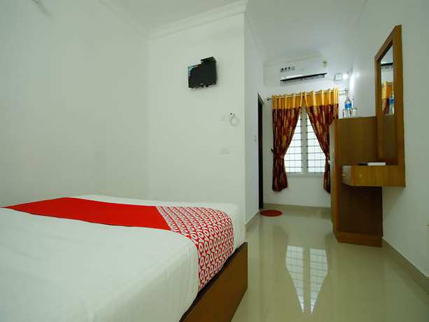 Imagen de la habitación del Hotel OYO 26964 Palm View Residency. Foto 5